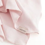 Nusseklud i lyserød til nyfødt og baby