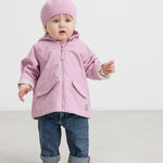 Baby wearing a yellow knitted hat and pink clothing.