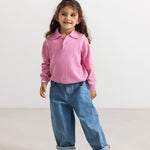 Kids' jeans in light indigo denim with straight legs and elastic waist.