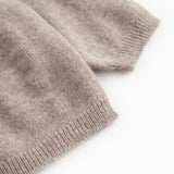 Ribbed and knitted fabric on the Tamla cashmere cardigan in alpaca blend.