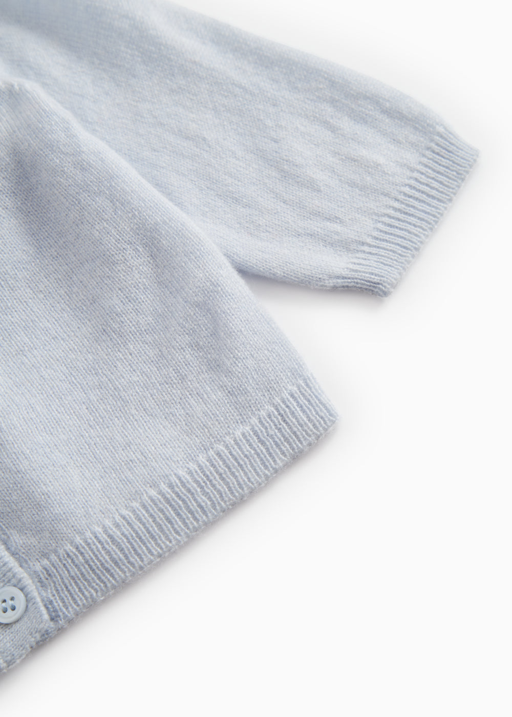 Light blue cardigan with ribbed cuffs and hem.