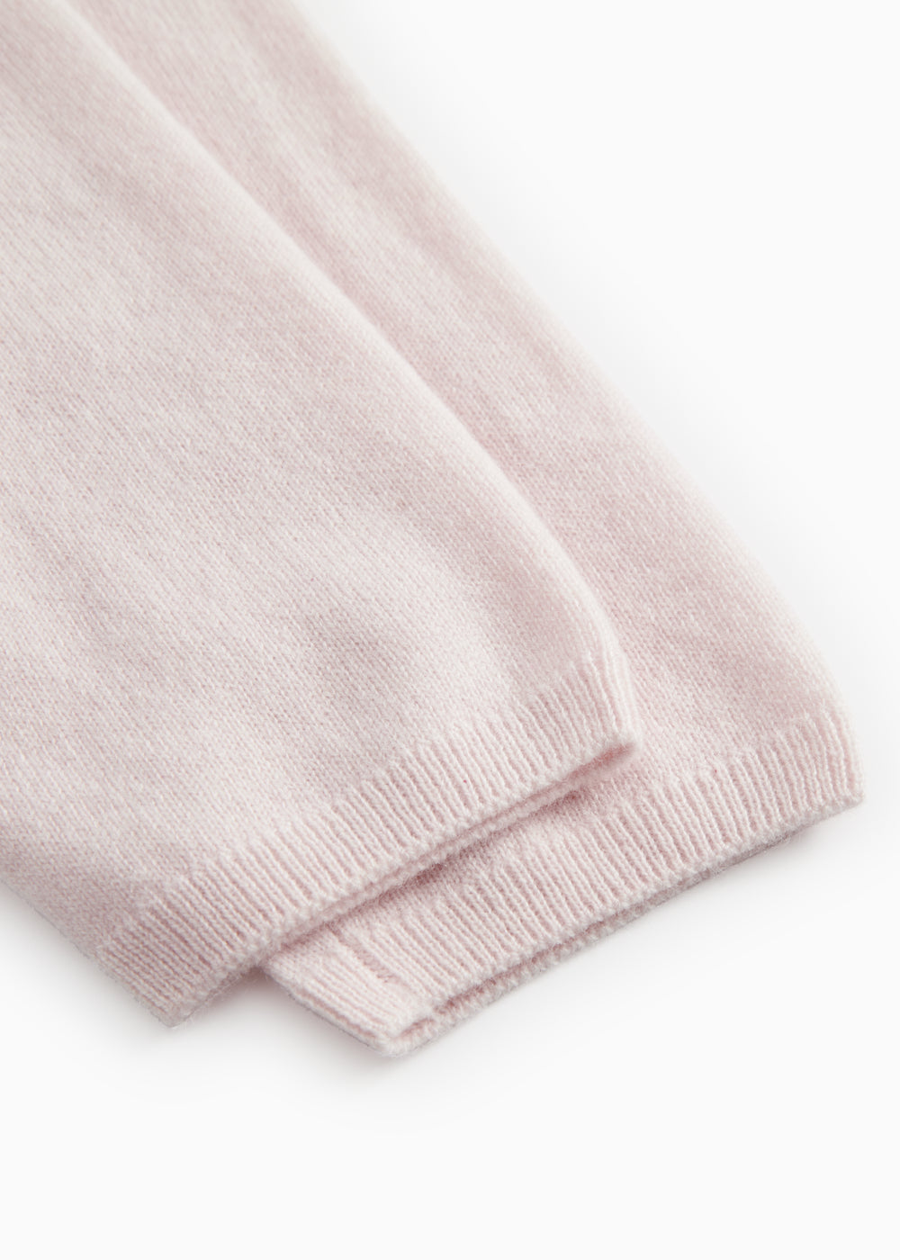 Pink Kashmir trousers with honey mel with a ribbed cuff at the bottom of the leg.