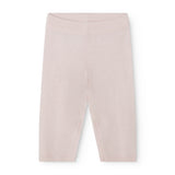 Powy khaki trousers and pink shirt, long with ribbed cuffs at the ankle.