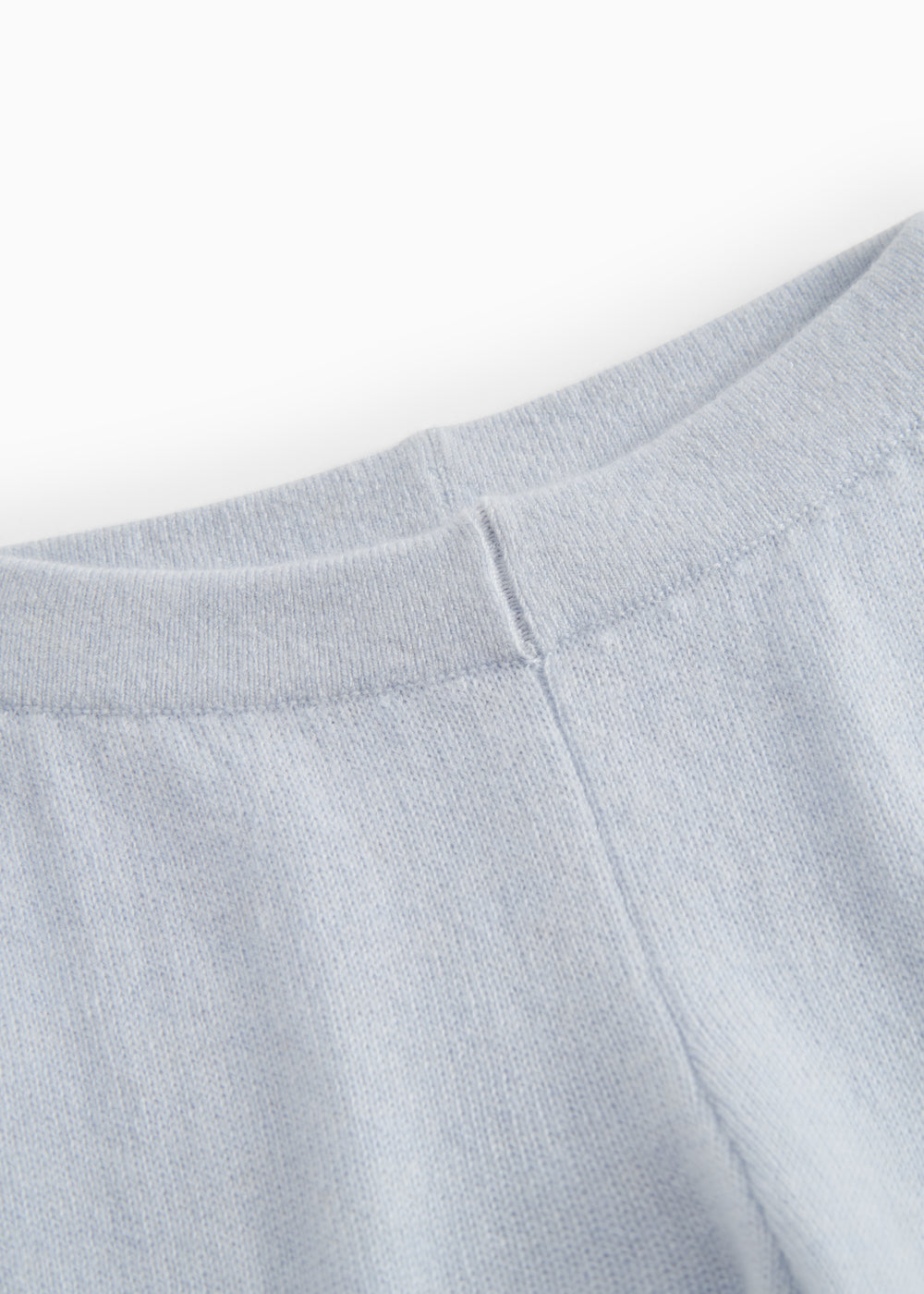 Light blue Kashmir trousers in a soft blend with gentle lining and a center seam.