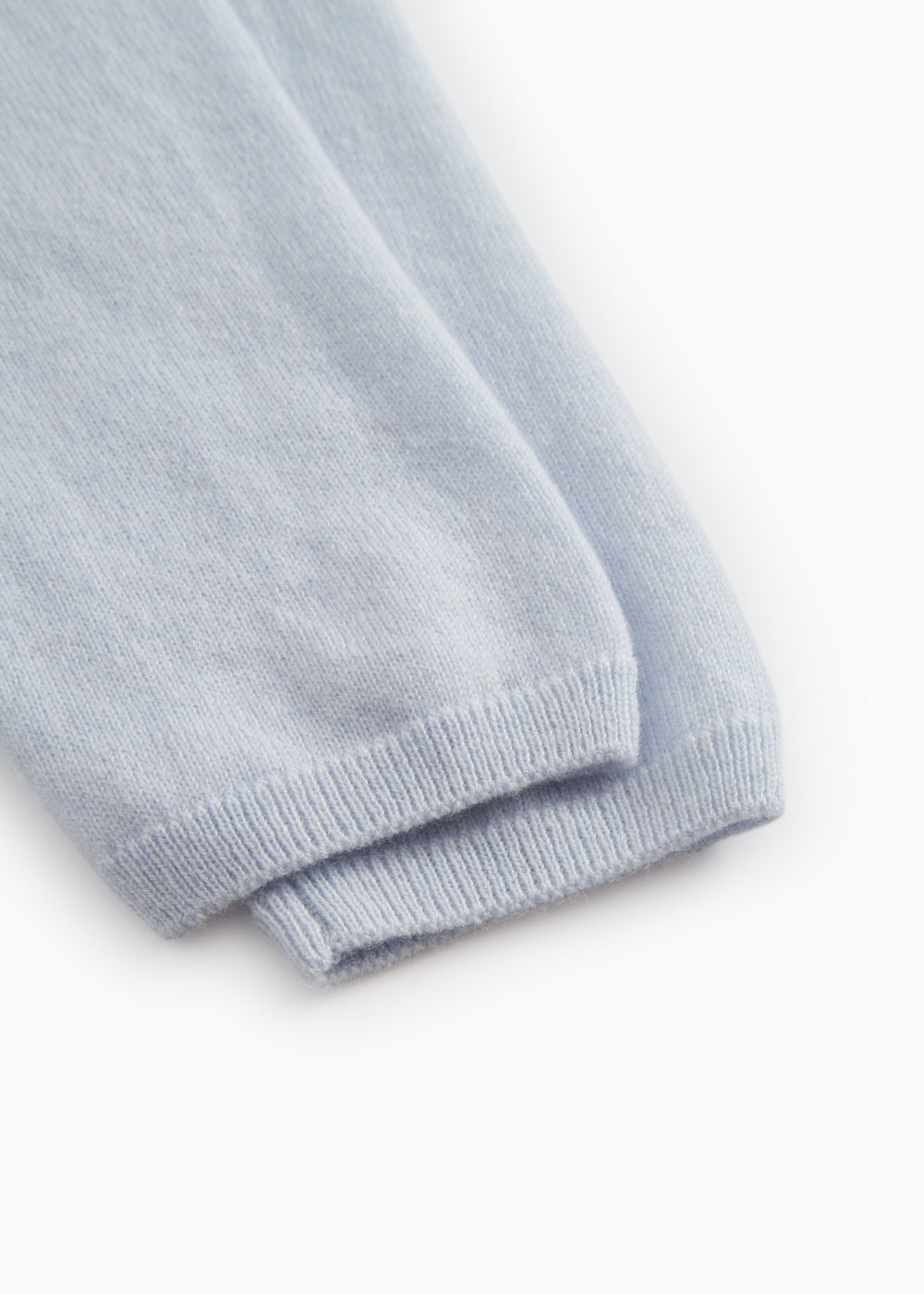 Light blue khaki trousers with ribbing at the leg opening.