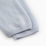 Light blue khaki trousers with ribbing at the leg opening.