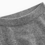 Gray melange Kashmir trousers with smooth lining and side seams.