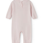 Pink cashmere blend suit with button closure at the neck and long trousers.