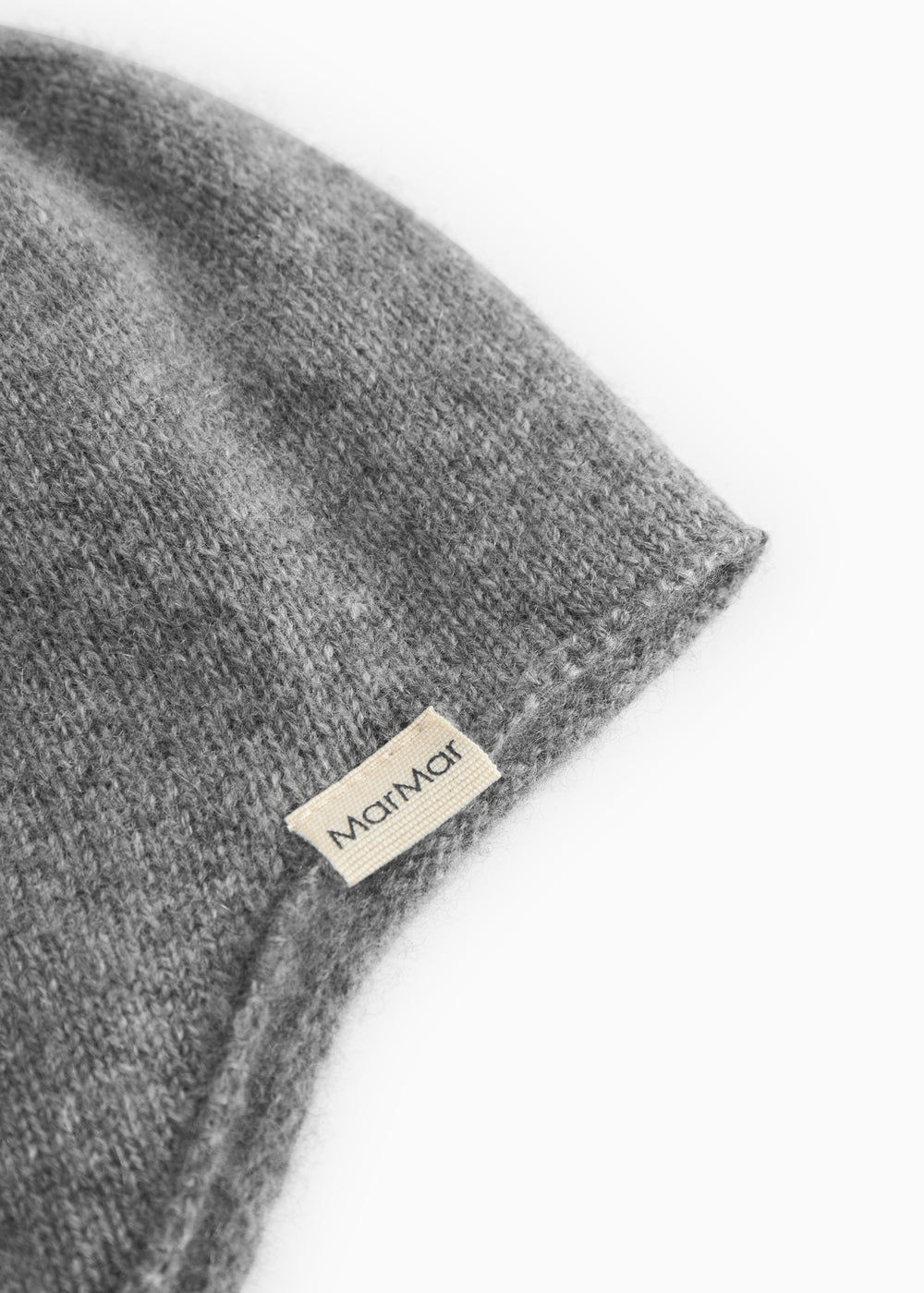 Aly Baby babyhue in gray melange, close-up of the label on the edge