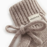 Knitted baby socks in gray-beige blend with ribbed edge and MarMar label, bow in front.