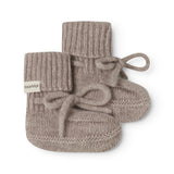 Knitted baby socks in gray-beige blend with ribbed edge and cuff detail.