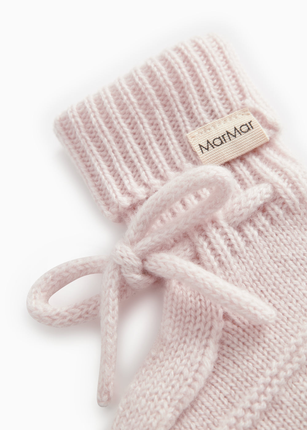 Pink knitted baby boots with rib, strap, and MarMar label