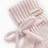 Pink knitted baby boots with rib, strap, and MarMar label