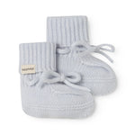 Knitted baby shoe in light blue with laces and ribbed edge