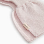 Cashmere baby wrap in pink with label "Mominmar".