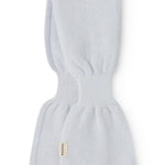 Light blue cashmere scarf for baby with fabric label, knitted and folded.