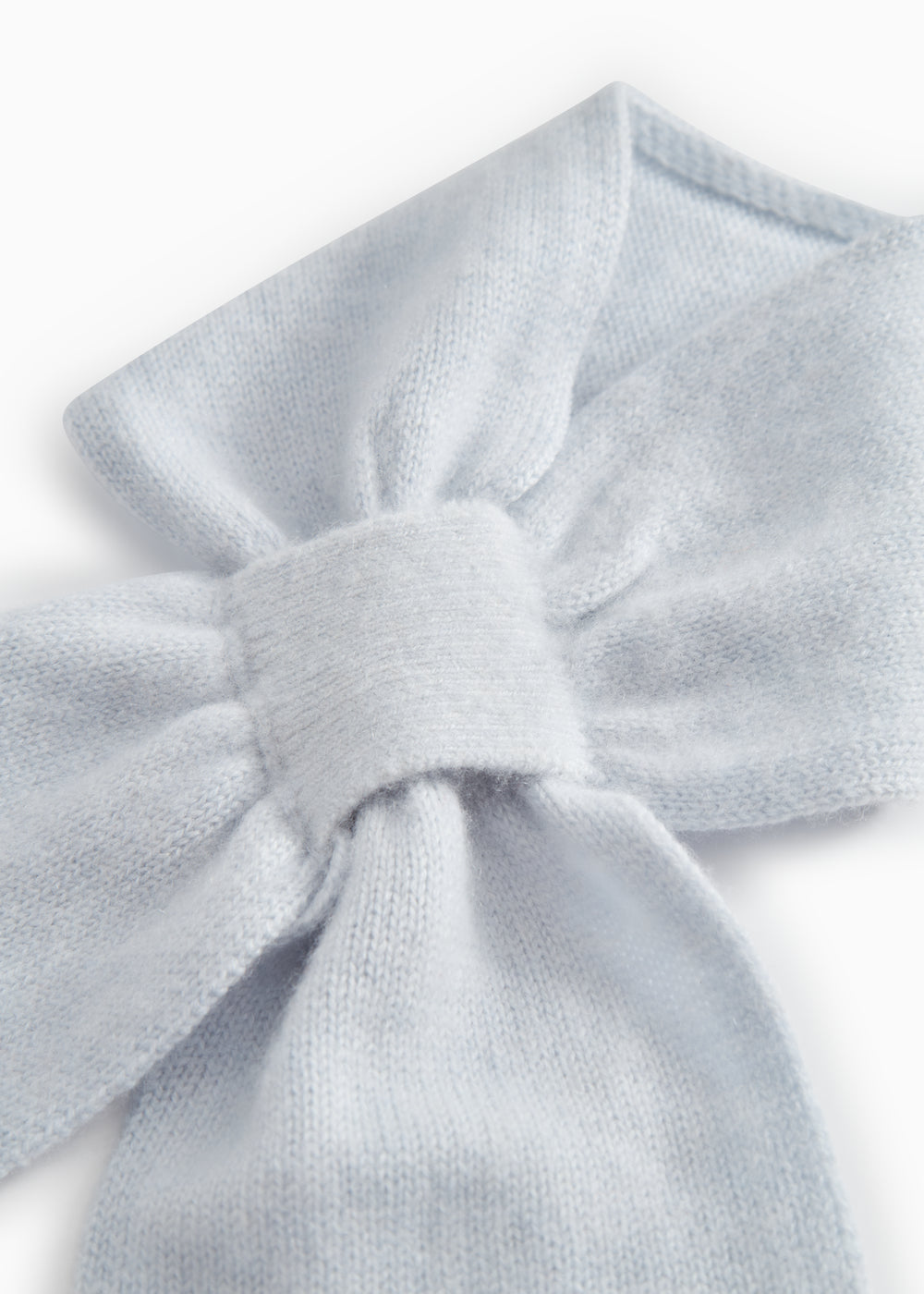 Light blue cashmere scarf with knot and soft knitted texture