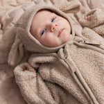 Teddy jacket for baby in muddy melange with hood and long sleeves.
