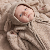Teddy jacket for baby in muddy melange with hood and long sleeves.
