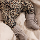 Leopard-patterned baby jumpsuit with ribbed cuff socks