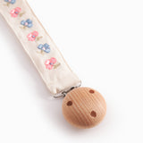 Suttesnor med gummiring, træ/metalklips og blomster