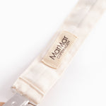 Suttesnor with rubber ring, wood/metal clip and train pattern