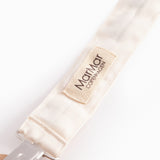 Suttesnor with rubber ring, wood/metal clip and train pattern