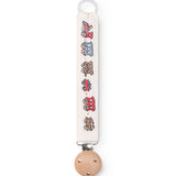 Suttesnor with rubber ring, wood/metal clip and train pattern