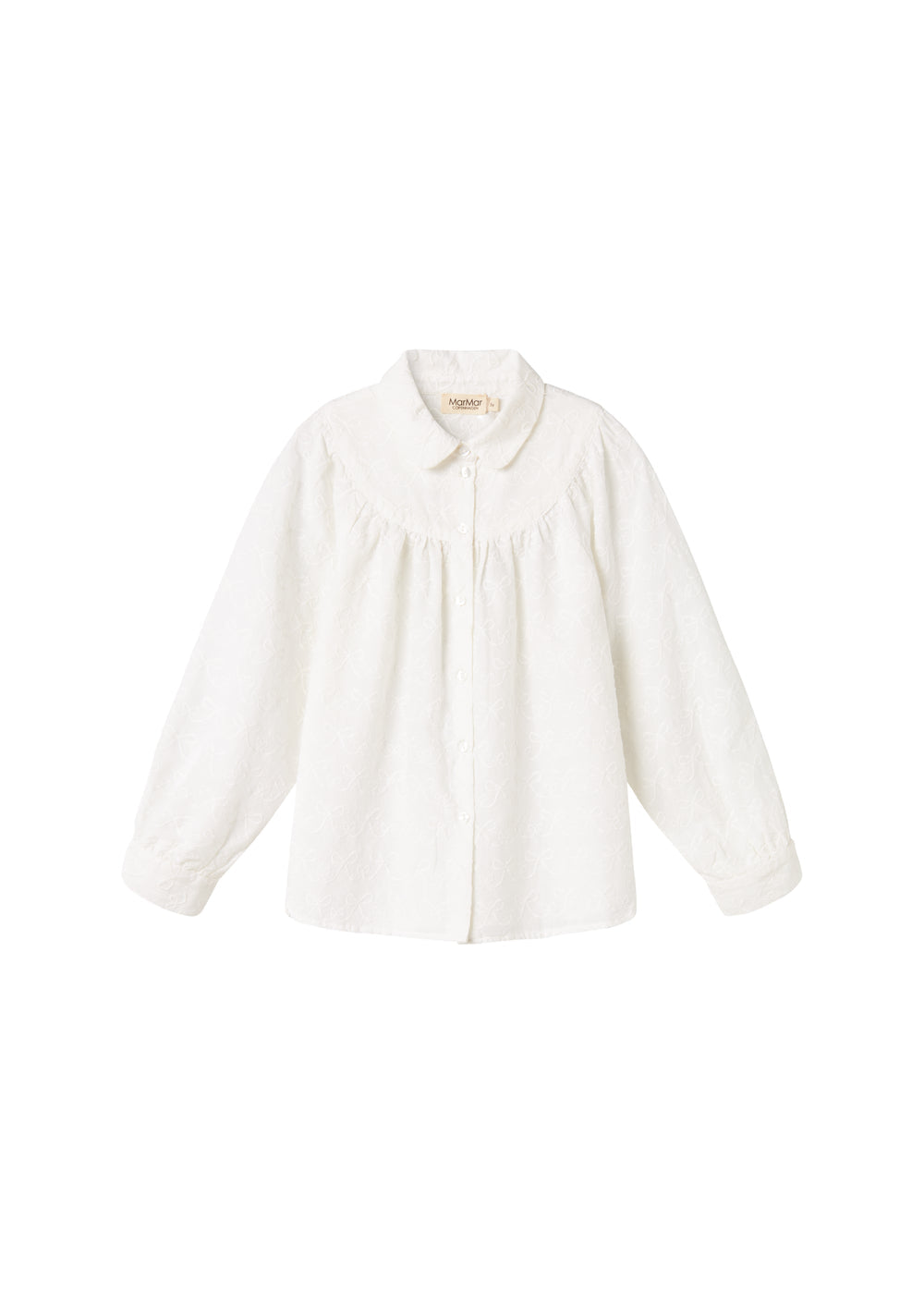 Hvid bluse til børn med broderet mønster og rund krave