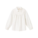 Hvid bluse til børn med broderet mønster og rund krave