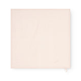 Ada (2-pack) cloth diaper in pink, solid-colored cloth with a string in the lower corner.