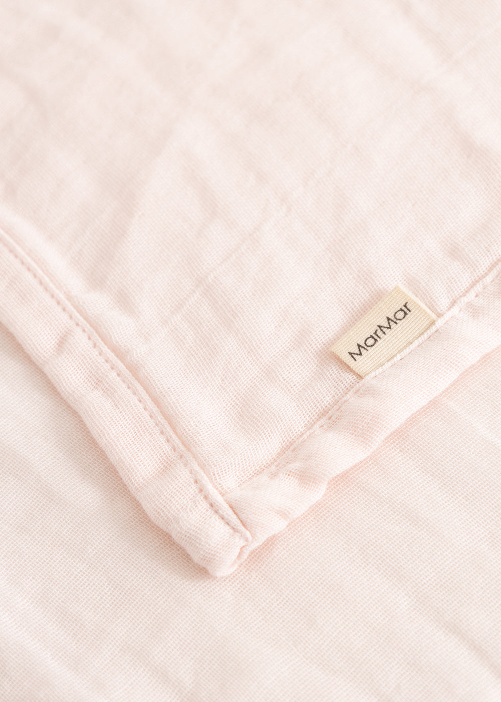 Ada (2-pack) cloth diaper in pink, folded corner with Marble brand.