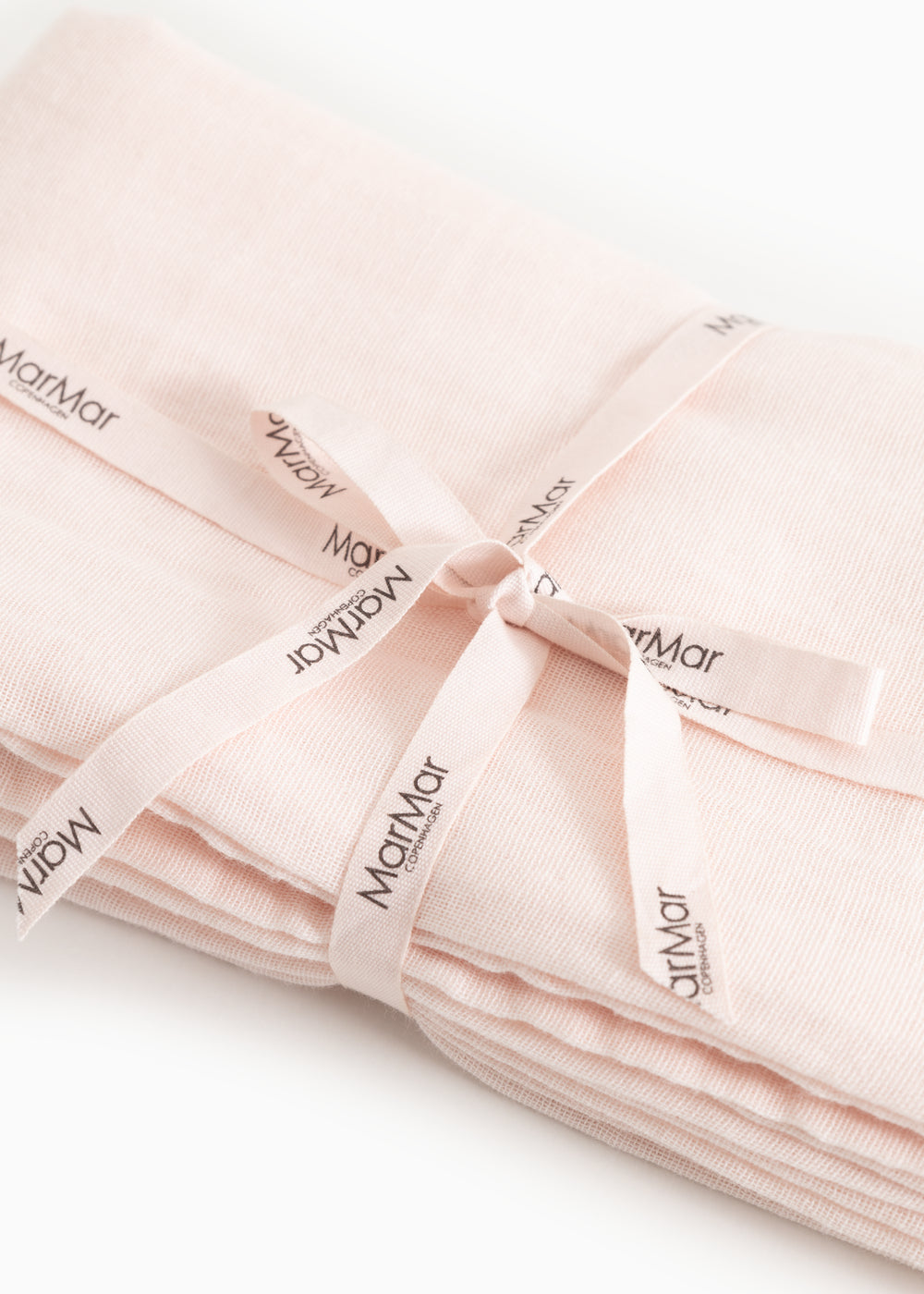 Rose wrap with tie and MamMar labels at the knot.