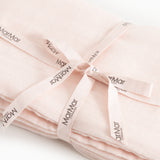 Rose wrap with tie and MamMar labels at the knot.