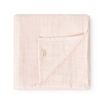 Rose wrap with triangular stitching and fabric label at the fold