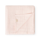 Rose wrap with triangular stitching and fabric label at the fold