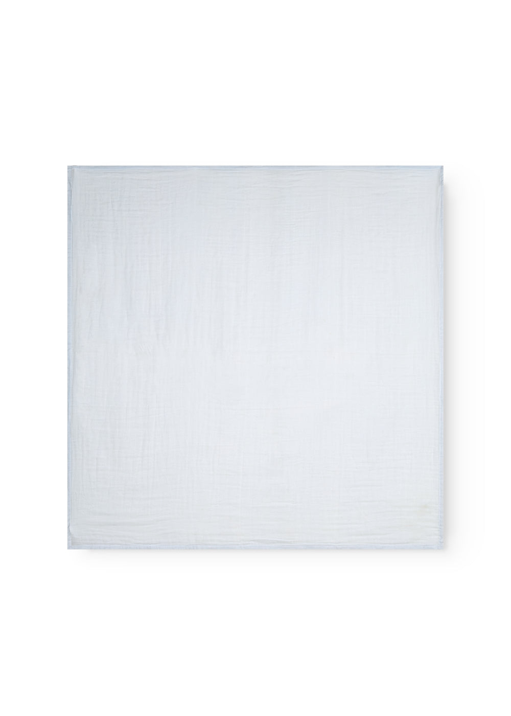 Blue silk wrap in smooth, folded fabric without pattern