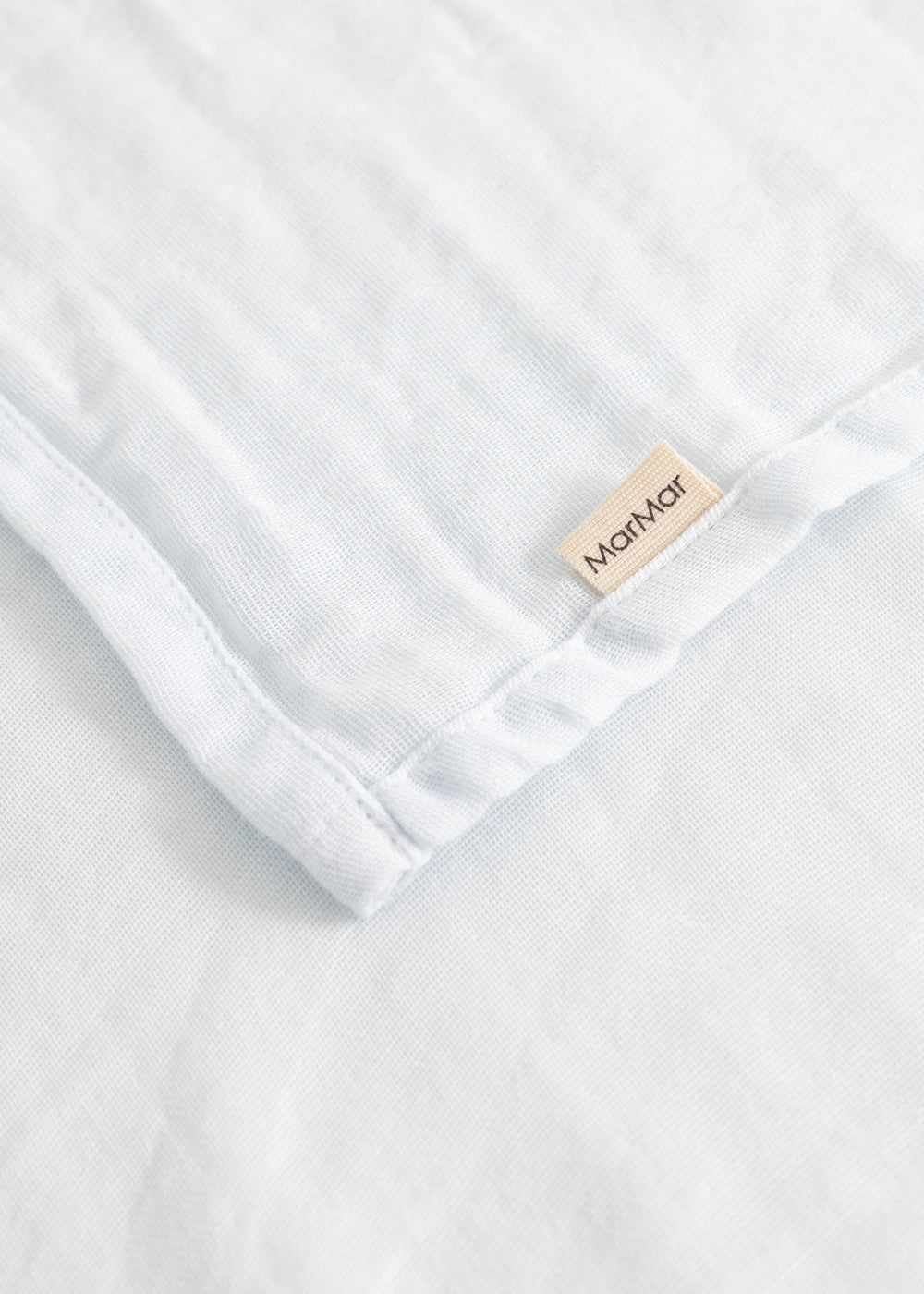 Light blue wrap with MarMar branding at seam and edge