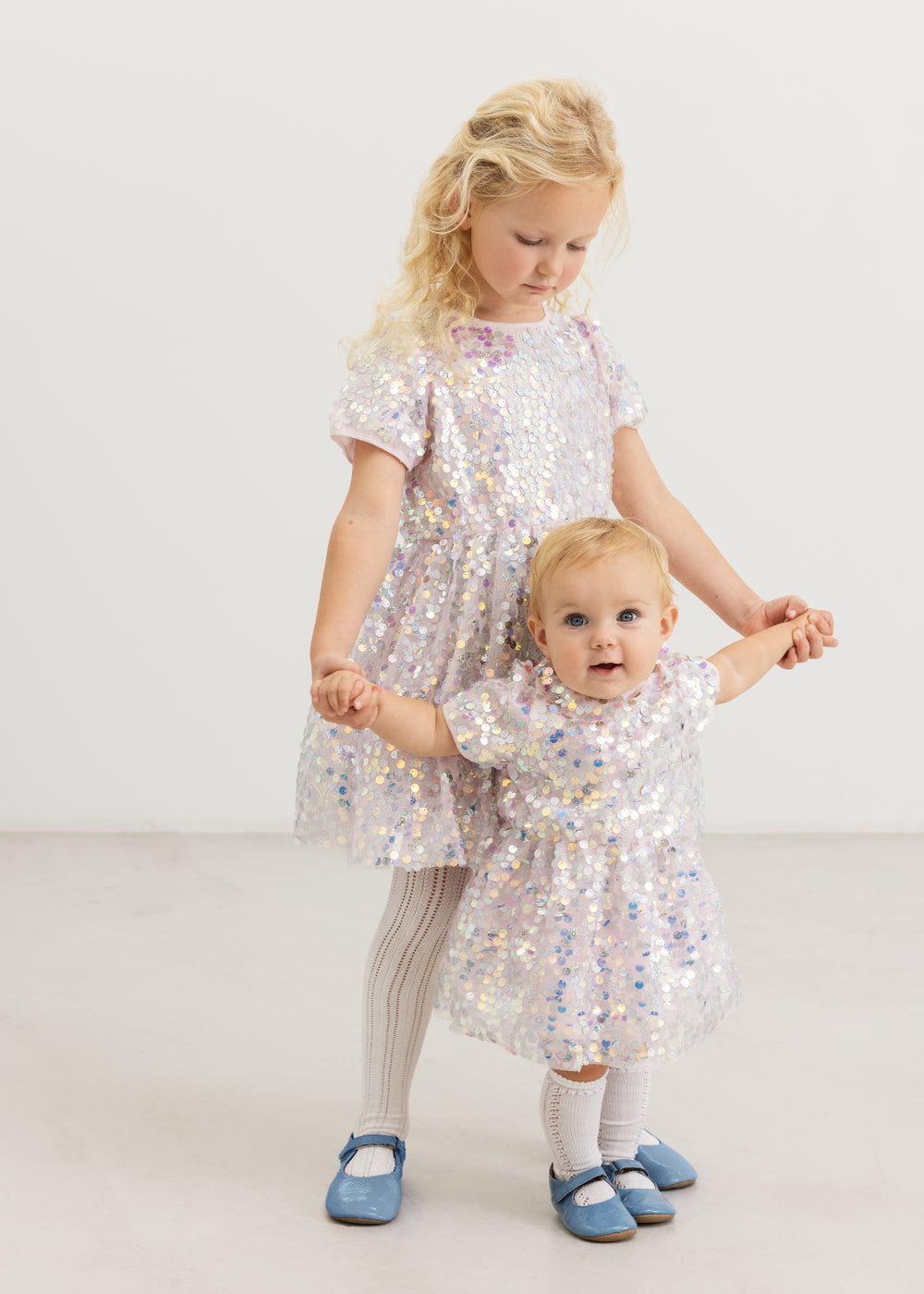 Silver sequin dress for children, short sleeves and A-line skirt