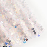 shimmering sequins in white/silver on skirt with elastic waistband