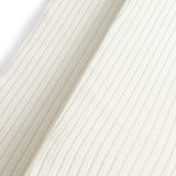 Ribstrikkede strømpebukser i cremefarvet bomuld til børn