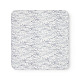 Baby blanket with Moomin print, rounded corners, and picot edges.