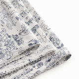 Baby blanket with Moomin print, rounded corners, and picot edges.