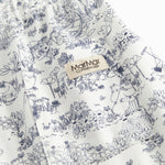 Shorts for children with a fine Moomin print, wide elastic, and ties at the waist.