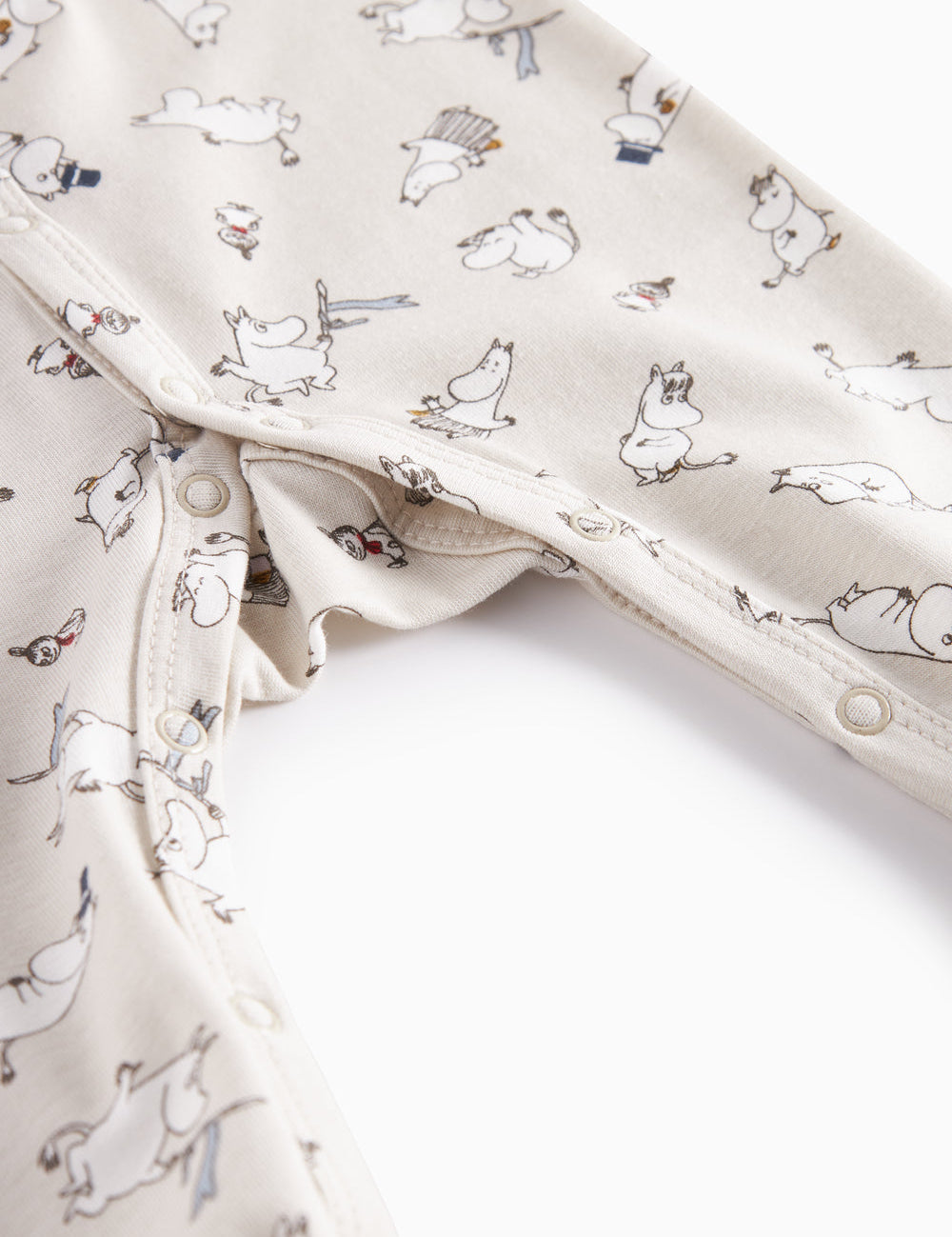 Baby's jumpsuit with long sleeves, snaps, mittens and Moomin print in bright colors