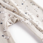 Heldragt til baby med lange ærmer og Moomin-tryk i lyse farver