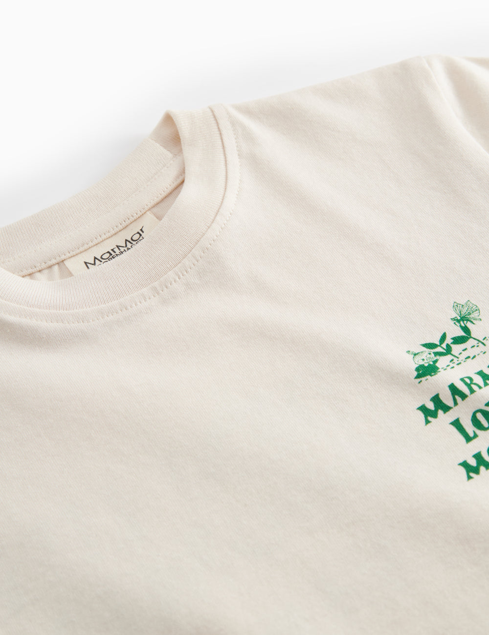 Råhvid T-shirt med grønt Moomin print til børn