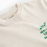 Råhvid T-shirt med grønt Moomin print til børn