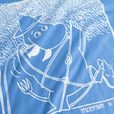 Blue blouse with white Moomin scout motif in front.