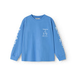 Long-sleeve blue blouse with small chest print and long sleeves.